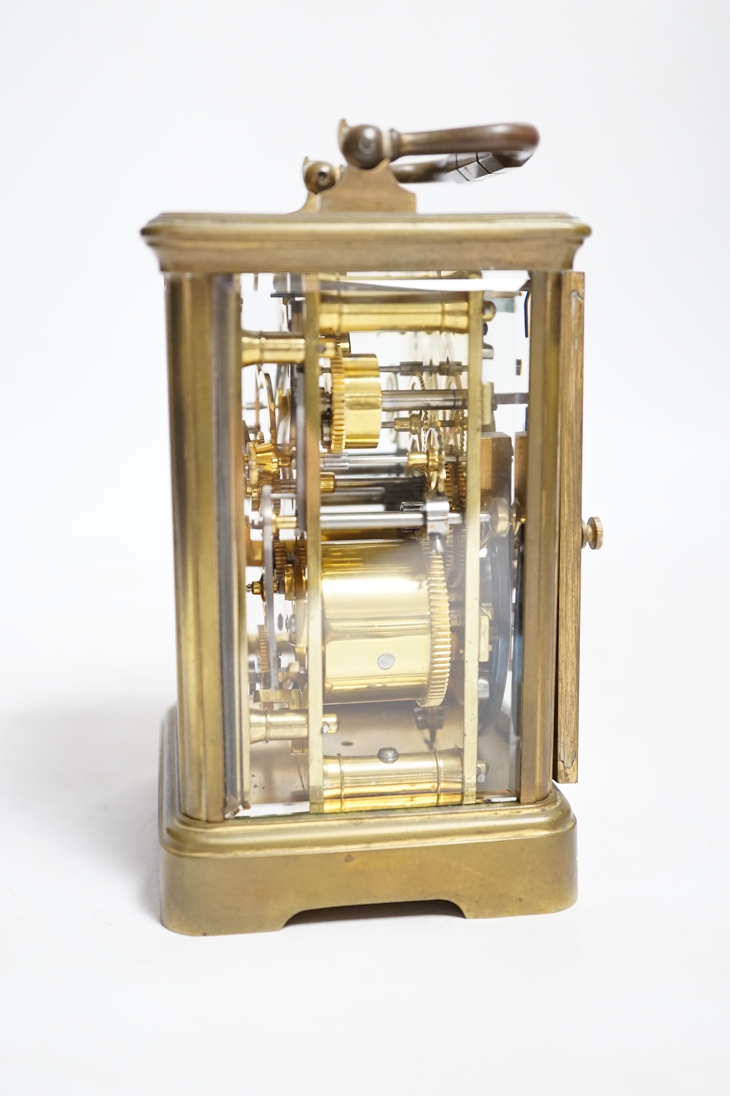 A late 19th century French brass cased eight day carriage clock with incorporated alarm mechanism, retailed by Dent, 12cm high